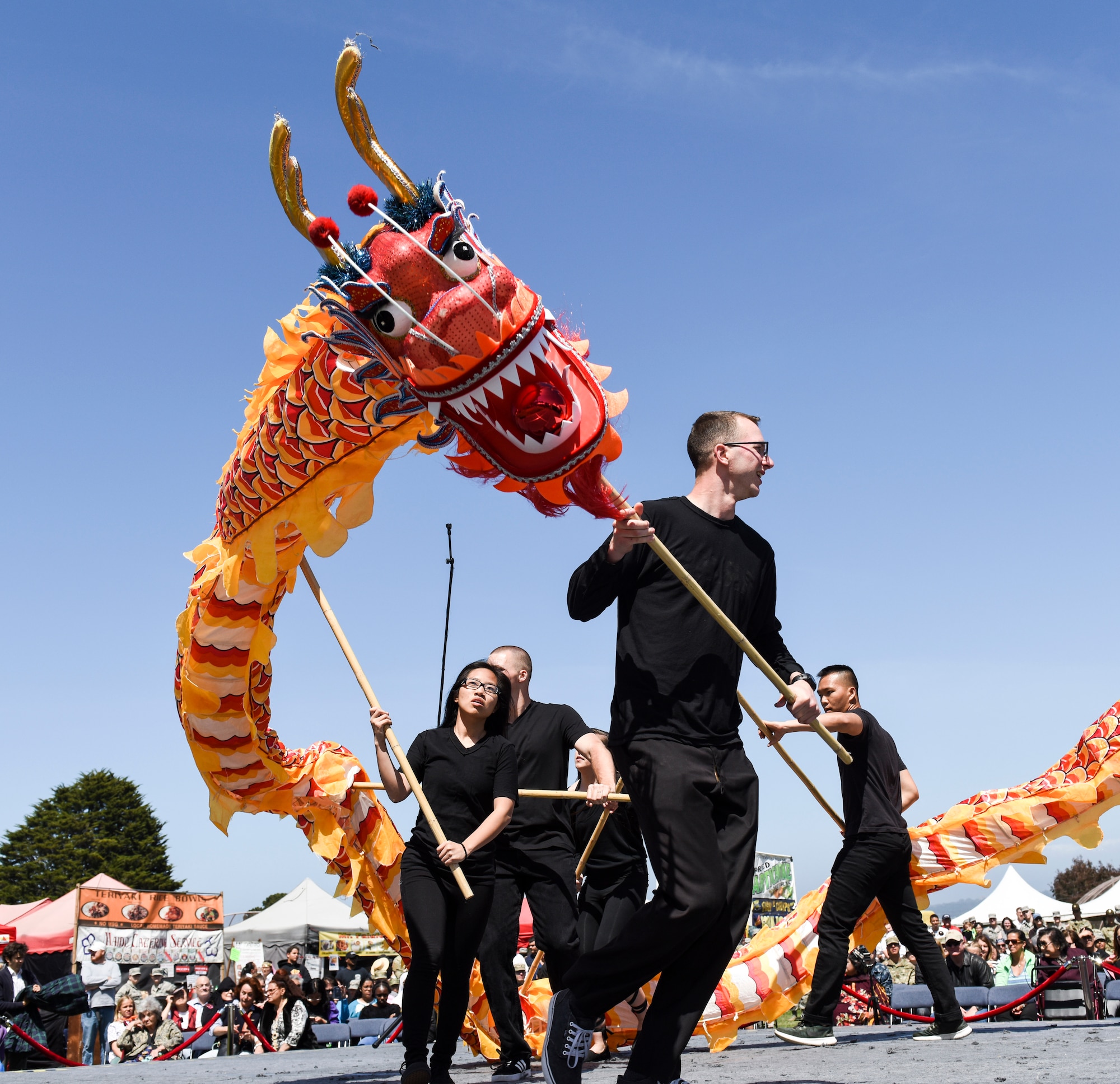 Students perform the Chinese Dragon Dance during the Defense Language Institute Foreign Language Center Language Day at the Presideo of Monterey, California, May 11, 2018. The Chinese Dragon Dance kicks off Language Day each year.