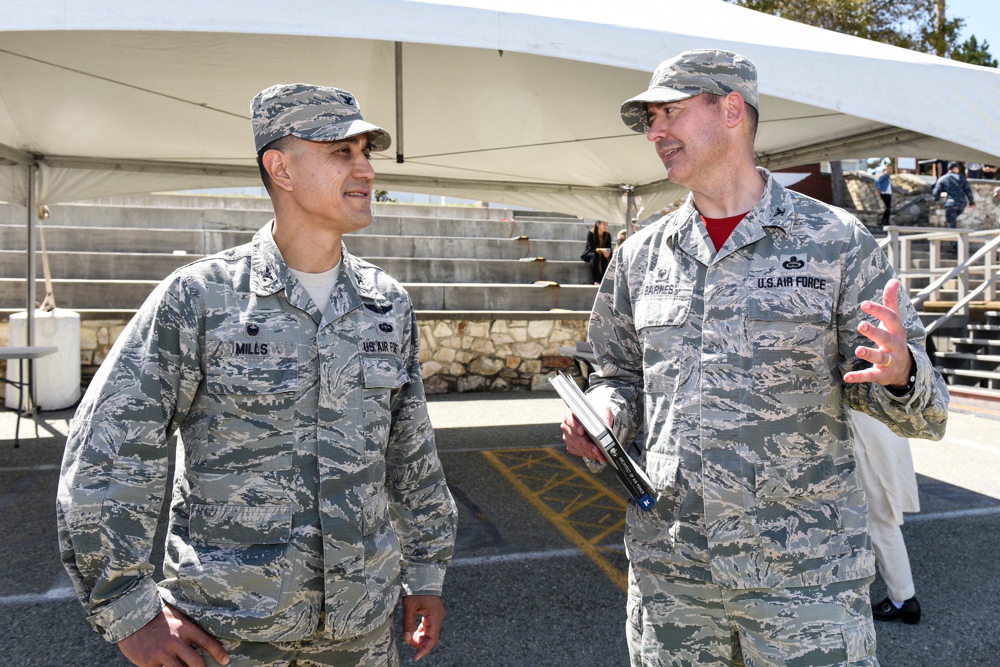 U.S. Air Force Col. Ricky Mills, 17th Training Wing commander and Col. Wiley Barnes, 517th Training Group commander discuss Language Day and the unique community opportunity to share in the Defense Language Institute Foreign Language Center's mission at the Presideo of Monterey, California, May 11, 2018. Mills was visiting from Goodfellow Air Force Base, San Angelo, Texas.