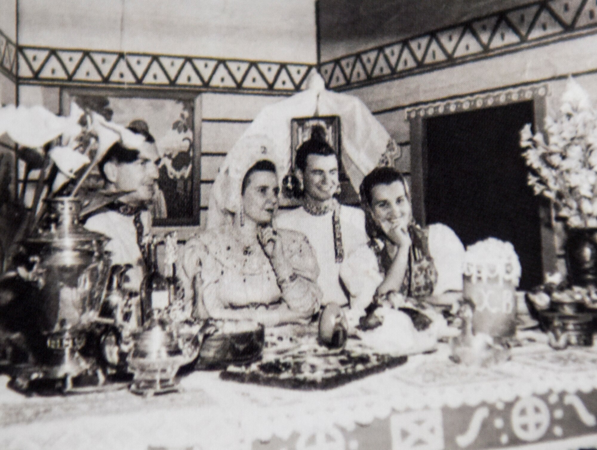 Family of Russian Faculty adorn the Russian display booth on April 25, 1952 from the Army Language School festival. The Russian booth was the largest of the many booths on display at the festival.