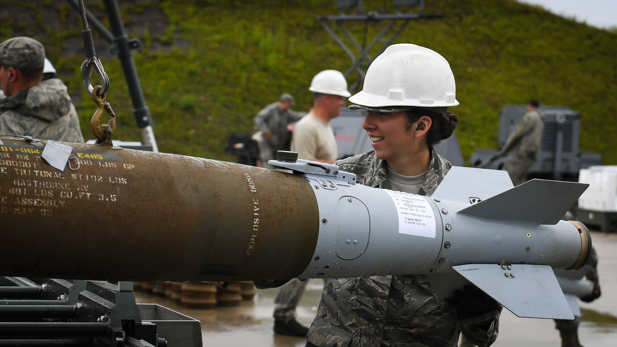 Airmen participating in CAPEX 2018, a combat ammunition production exercise, disassemble munitions on Gwangju Air Force Base, Gwangju, Republic of Korea, May 7, 2018.