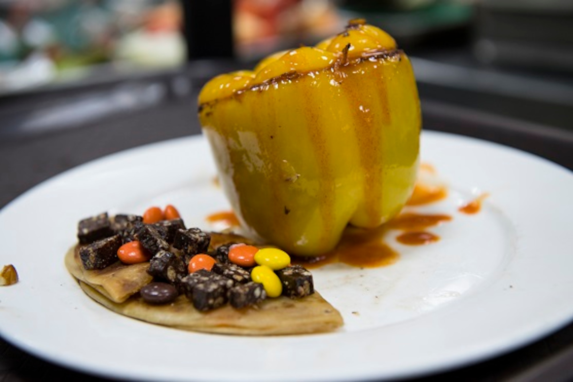 The winning dish of the ‘Chopped on the Rock’ cooking competition is displayed before judging at an undisclosed location in Southwest Asia, May 9, 2018. Five 386th Expeditionary Force Support Squadron Airmen competed in the 30 minute competition. (U.S. Air Force photo by Staff Sgt. Joshua King)