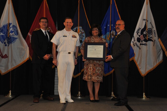 The E and H Department Acquisition Team received the Award of Merit for Group Achievement at the annual awards ceremony held Apr. 26 at the Fredericksburg Expo and Conference Center.