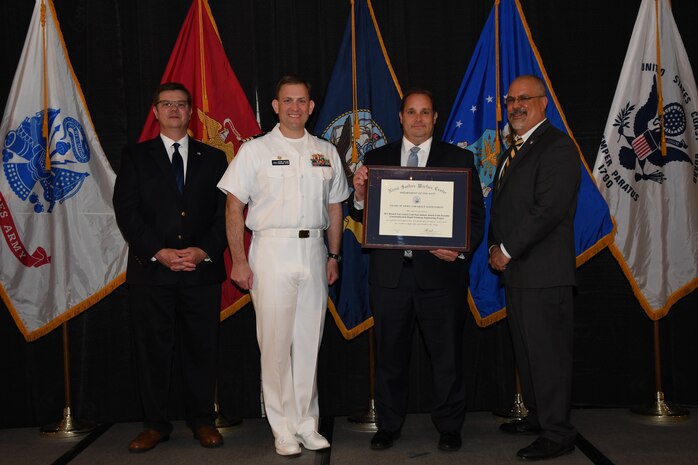 IMAGE: The R21 Branch Fast Act Craft - Fast Inshore Attack Craft Portable Embarkable Kits Rapid Prototype Engineering Project Team received the Award of Merit for Group Achievement at the Naval Surface Warfare Center Dahlgren Division's annual honorary awards ceremony held Apr. 26 at the Fredericksburg Expo and Conference Center.