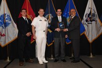 IMAGE: The Explosive Ordnance Disposal (EOD)
Cybersecurity Engineering and Test Team received the Technology to the Warfighter Award at the NSWCDD Honorary Awards Ceremony held at the Fredericksburg Expo and Conference Center, April 26. The Technology to the Warfighter Award recognizes individuals or groups who have had a notable and significant impact on the warfighter by developing needed capability and transitioning it into operations. The intent of this award is to recognize direct contributions to the warfighter and their operational impact.