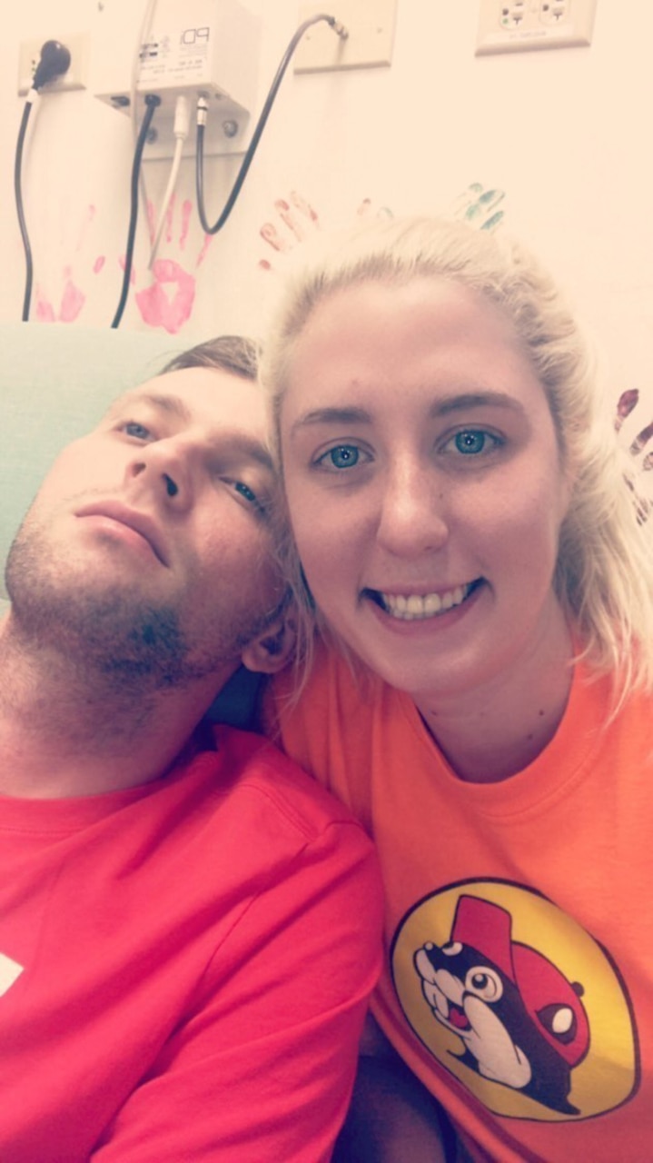 Soldier and his wife during chemotherapy treatment.
