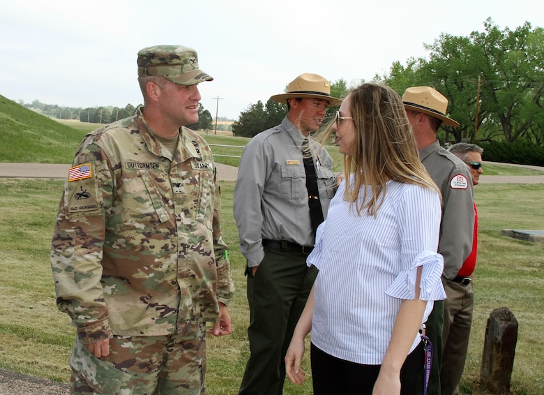 Col. Douglas Guttormsen speaks with Kristin Conley, representative for Sen. Jerry Moran, with his Manhattan, Kansas office, prior to the ribbon cutting ceremony May 11, 2018. Conley had a prime interest in the agricultural benefits farms in Kansas gain from the purpose of irrigation enhanced by repairs to the dam.
