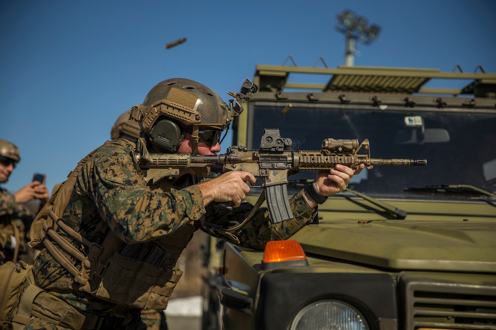 A U.S. Marine with 1st Platoon, 1st Reconnaissance Battalion, 1st Marine Division, conducts barrier shooting drills during Exercise Platinum Ren at Fort Trondennes, Harstad, Norway, May 10, 2018.
