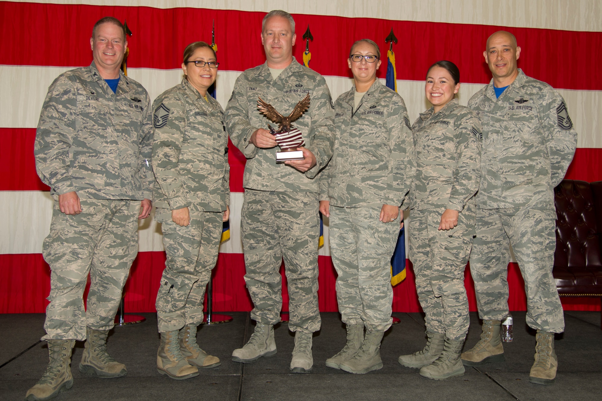 Reservists from the Colorado Springs Regional Command Post receive the Air Force Reserve Command Large Command Post of the Year award,2017, for the third year in the row during a commander’s call, May 6, 2018, at Peterson Air Force Base, Colorado.