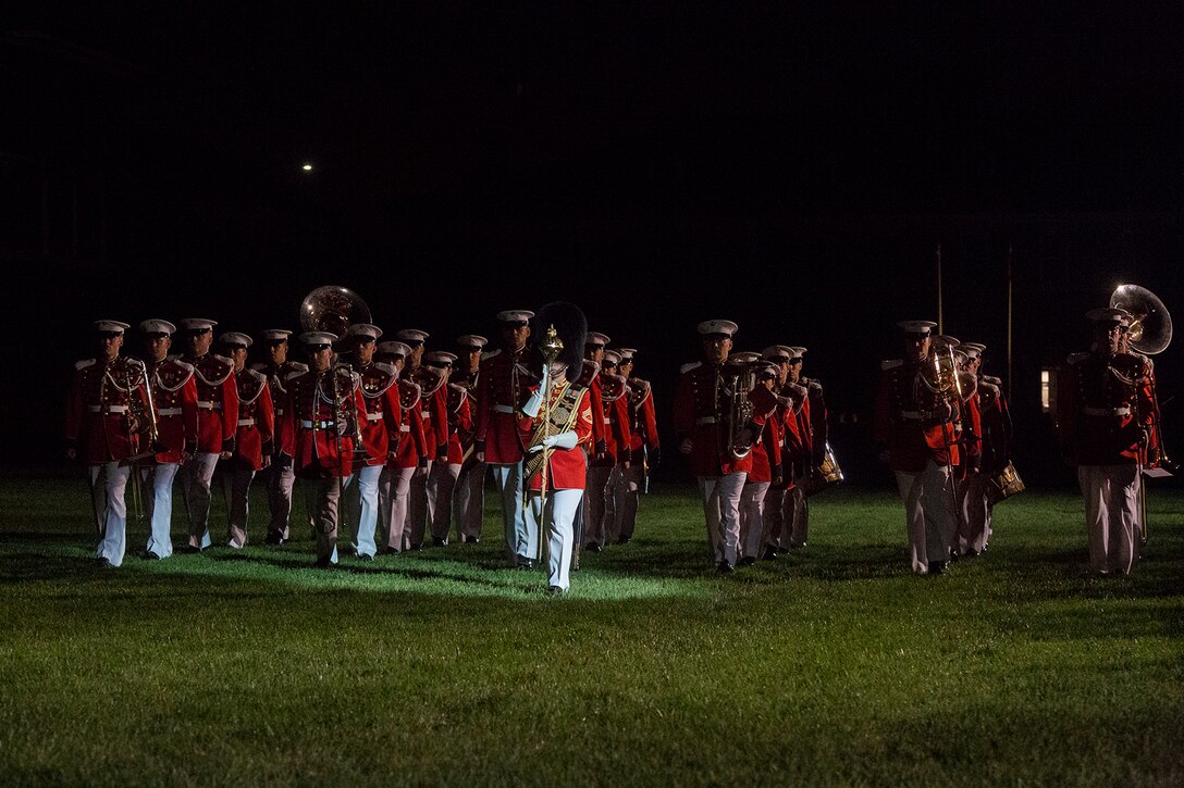 Marines with “The President’s Own” U.S. Marine Band march across the parade deck during a Friday Evening Parade at Marine Barracks Washington D.C., May 11, 2018.