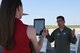 Lt. Col. Ed Garcia, 53rd Weather Reconnaissance Squadron pilot, talks about the Hurricane Hunter mission during a Facebook Live session with the National Weather Service May 10, 2018. The 53rd WRS, an Air Force Reserve unit in the 403rd Wing at Keesler Air Force Base, Mississippi, took part in the 2018 NOAA Gulf Coast Hurricane Awareness Tour May 7-11, 2018. This is the fourth year the Hurricane Hunters participated in all five stops of the awareness and preparedness event, which was in conjunction with National Hurricane Preparedness Week. (U.S. Air Force photo/Maj. Marnee A.C. Losurdo)