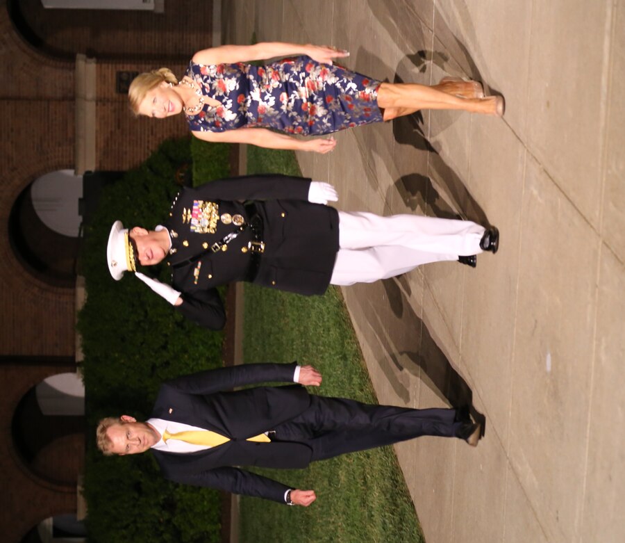 The Deputy Secretary of Defense Patrick M. Shanahan, left, and the Assistant Commandant of the Marine Corps Gen. Glenn M. Walters and his wife Gail Walters walk down Center Walk during a Friday Evening Parade at Marine Barracks Washington D.C., May 11, 2018. Shanahan was the guest of honor for the parade, and it was hosted by Gen. Walters.