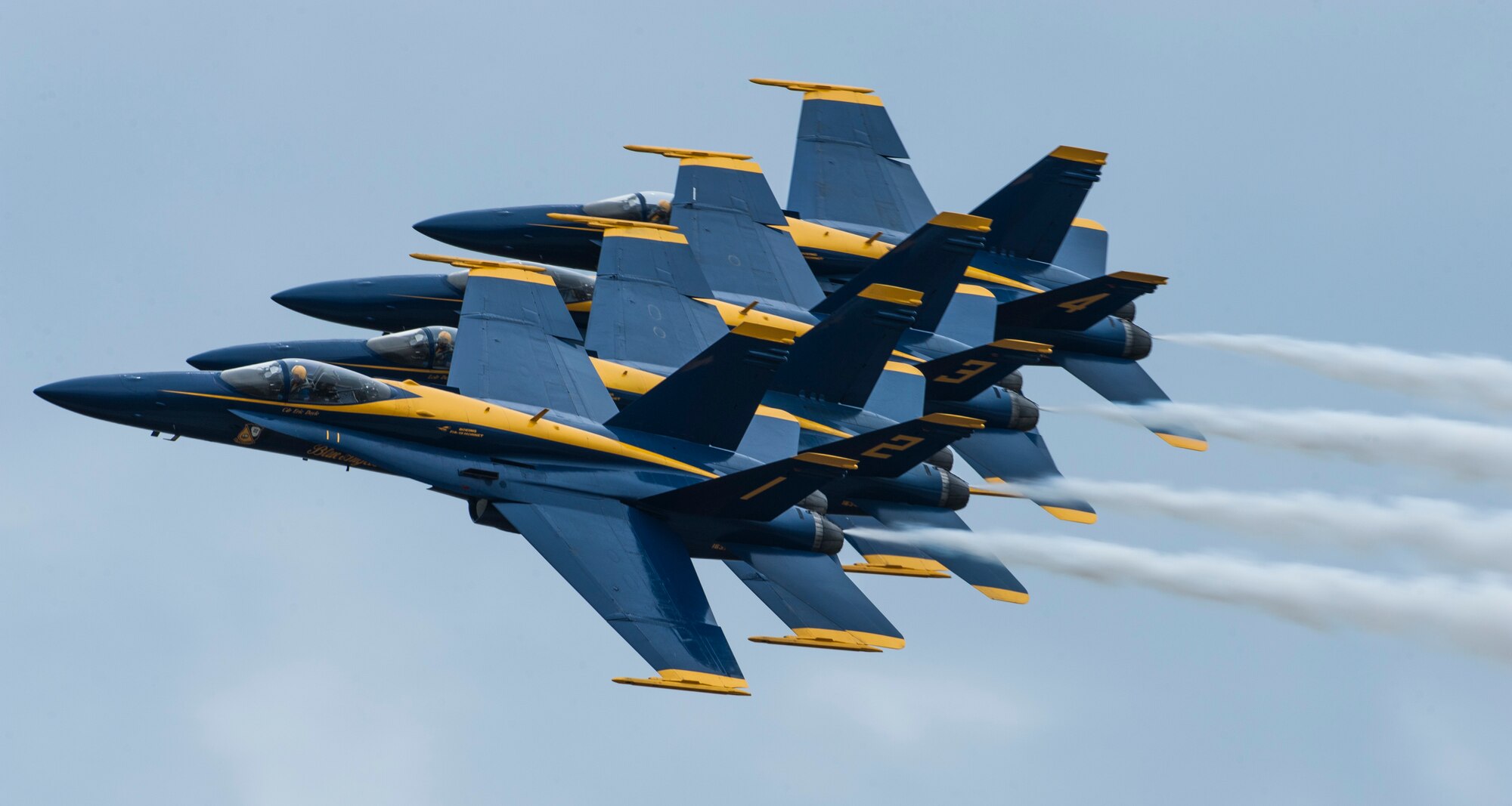 The U.S. Navy Flight Demonstration Squadron, the Blue Angels, fly in a right-echelon formation during their Tampa Bay AirFest 2018 performance at MacDill Air Force Base, Fla., May 13, 2018.