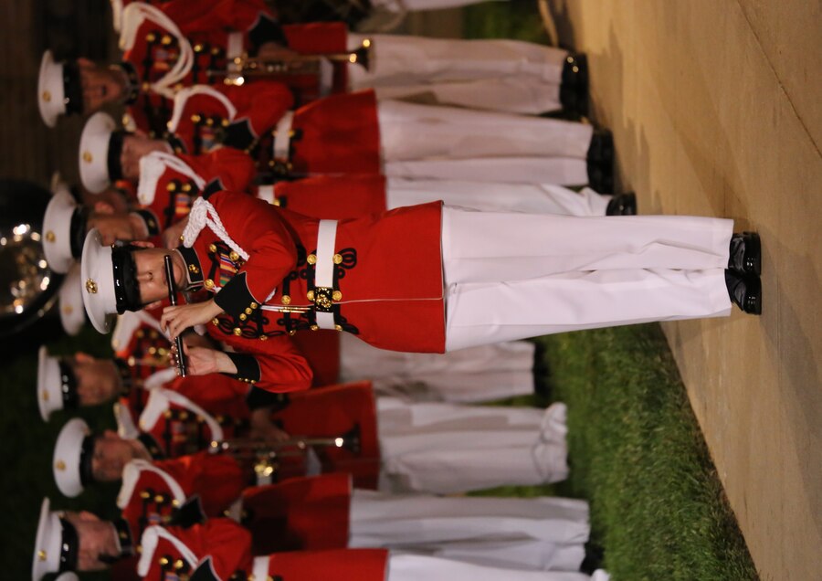Staff Sgt. Kara Santos, piccolo player with “The President’s Own” U.S. Marine Band, plays a solo during a Friday Evening Parade at Marine Barracks Washington D.C., May 11, 2018. The guest of honor for the parade was Deputy Secretary of Defense Patrick M. Shanahan, and was hosted by the Assistant Commandant of the Marine Corps Gen. Glenn M. Walters.