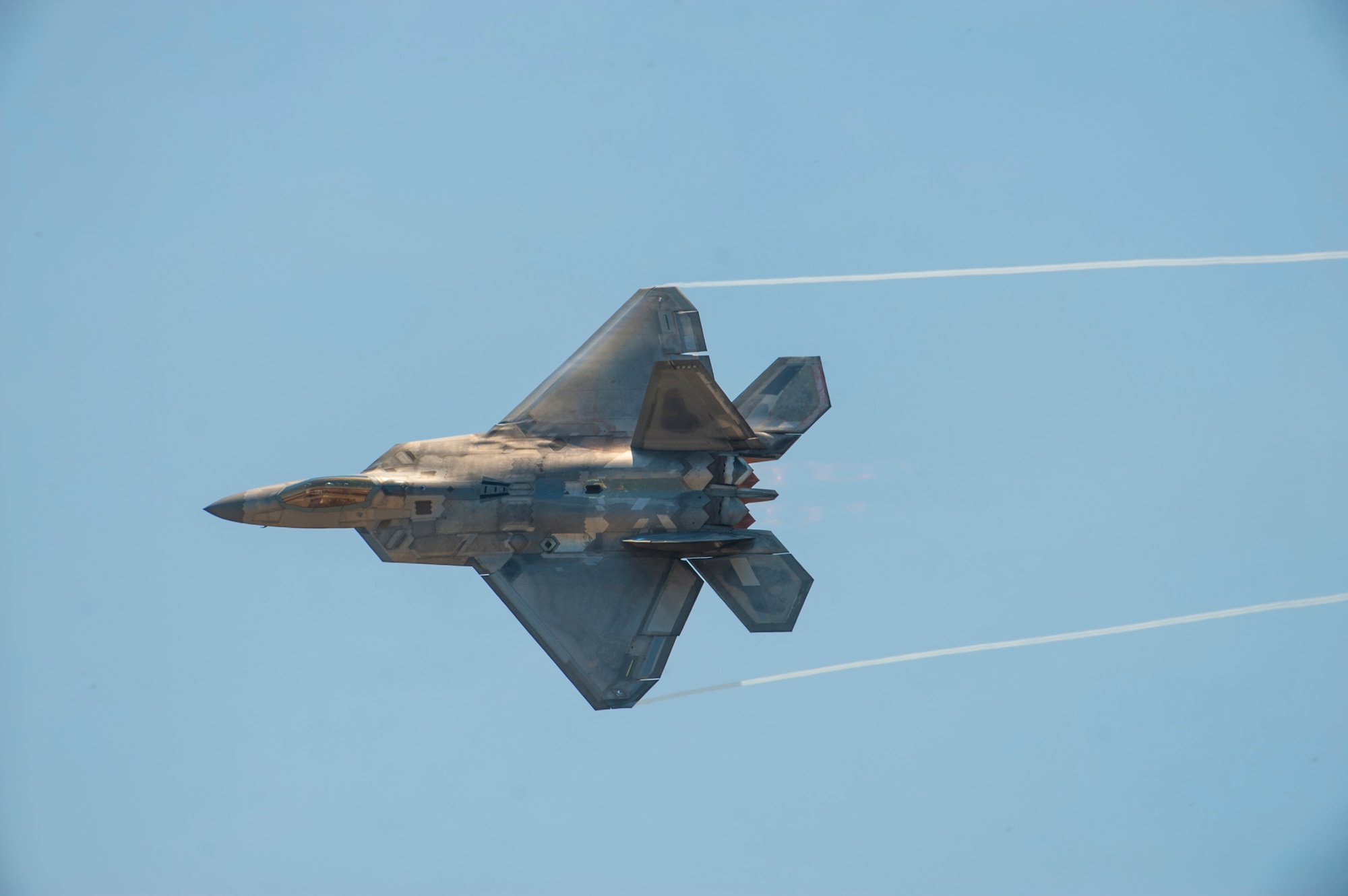 An F-22 Raptor performs high-speed turns during Tampa Bay AirFest 2018 at MacDill Air Force Base, Fla., May 11, 2018.