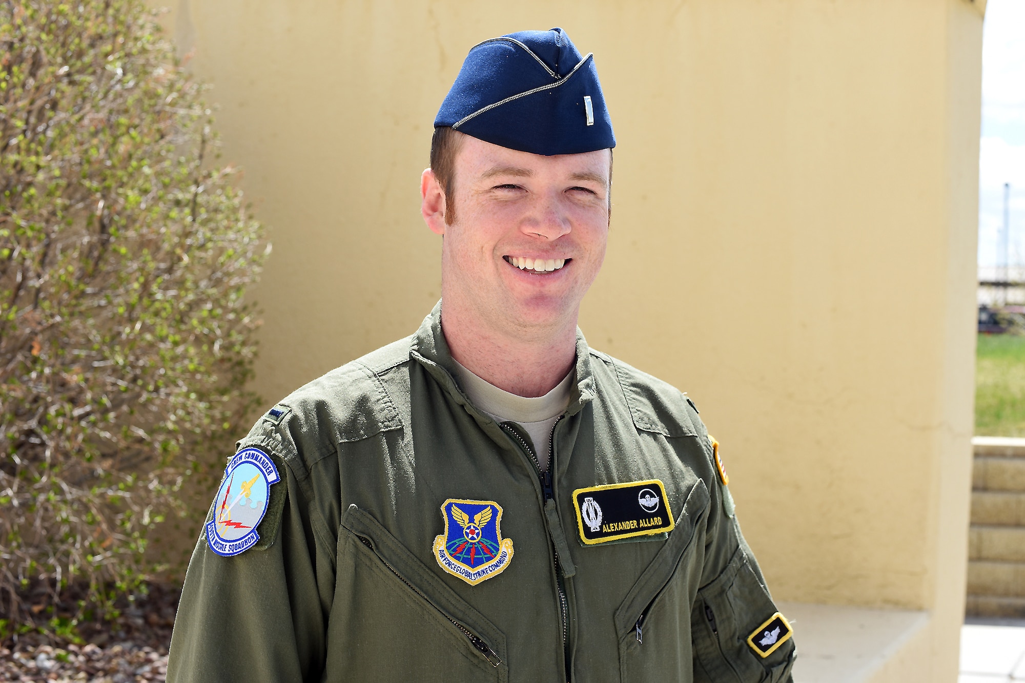 1st Lt. Alexander “Ara” Allard, 490th Missile Squadron missile squadron safety officer and assistant flight commander, poses at the 341st Missile Wing headquarters building after returning from missile field duty on May 8, 2018, at Malmstrom Air Force Base, Mont. Allard is participating in a pilot program that broadens safety knowledge and practices in intercontinental ballistic missile operations. (U.S. Air Force photo by Kiersten McCutchan)