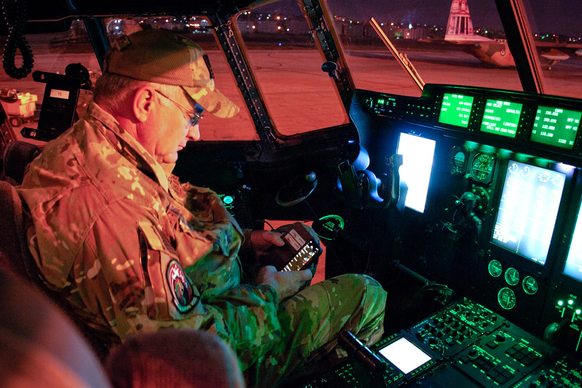 U.S. Air Force Reserve Chief Master Sgt. Donald Tarrance, 327th Airlift Squadron superintendent, conducts pre-flight checks in Amman, Jordan on April 16, 2018.