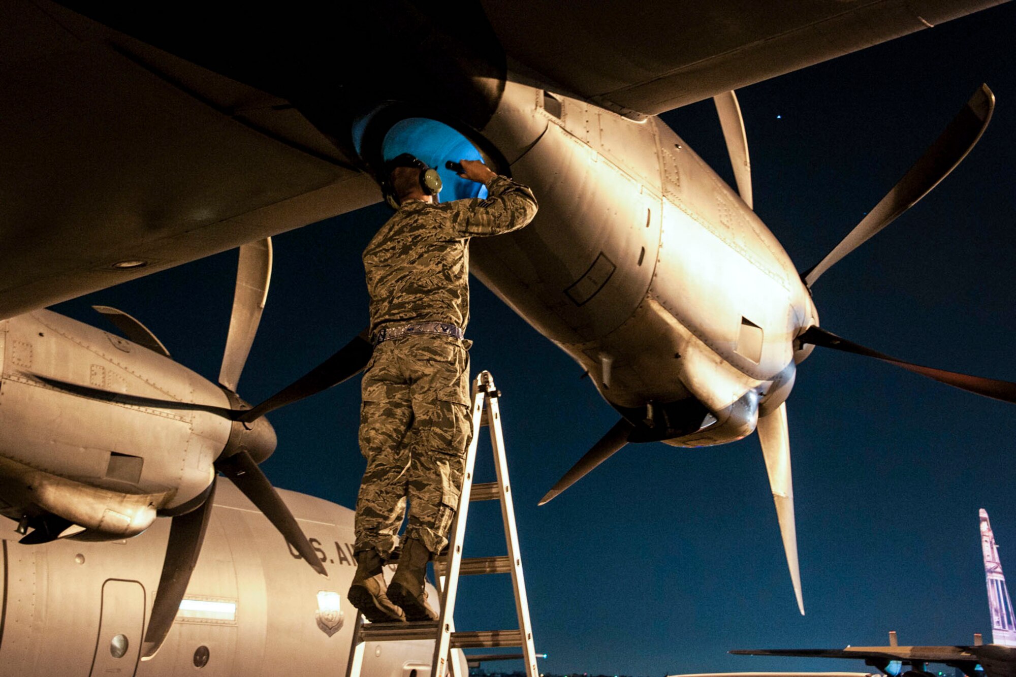 A U.S. Air Force Reserve Citizen Airman performs an inlet and exhaust inspection in Amman, Jordan on April 11, 2018. Approximately 40 Reserve Citizen Airmen and one C-130J Super Hercules from the 913th Airlift Group, Little Rock Air Force Base, Ark., deployed to Jordan in support of Exercise? Eager Lion 2018.