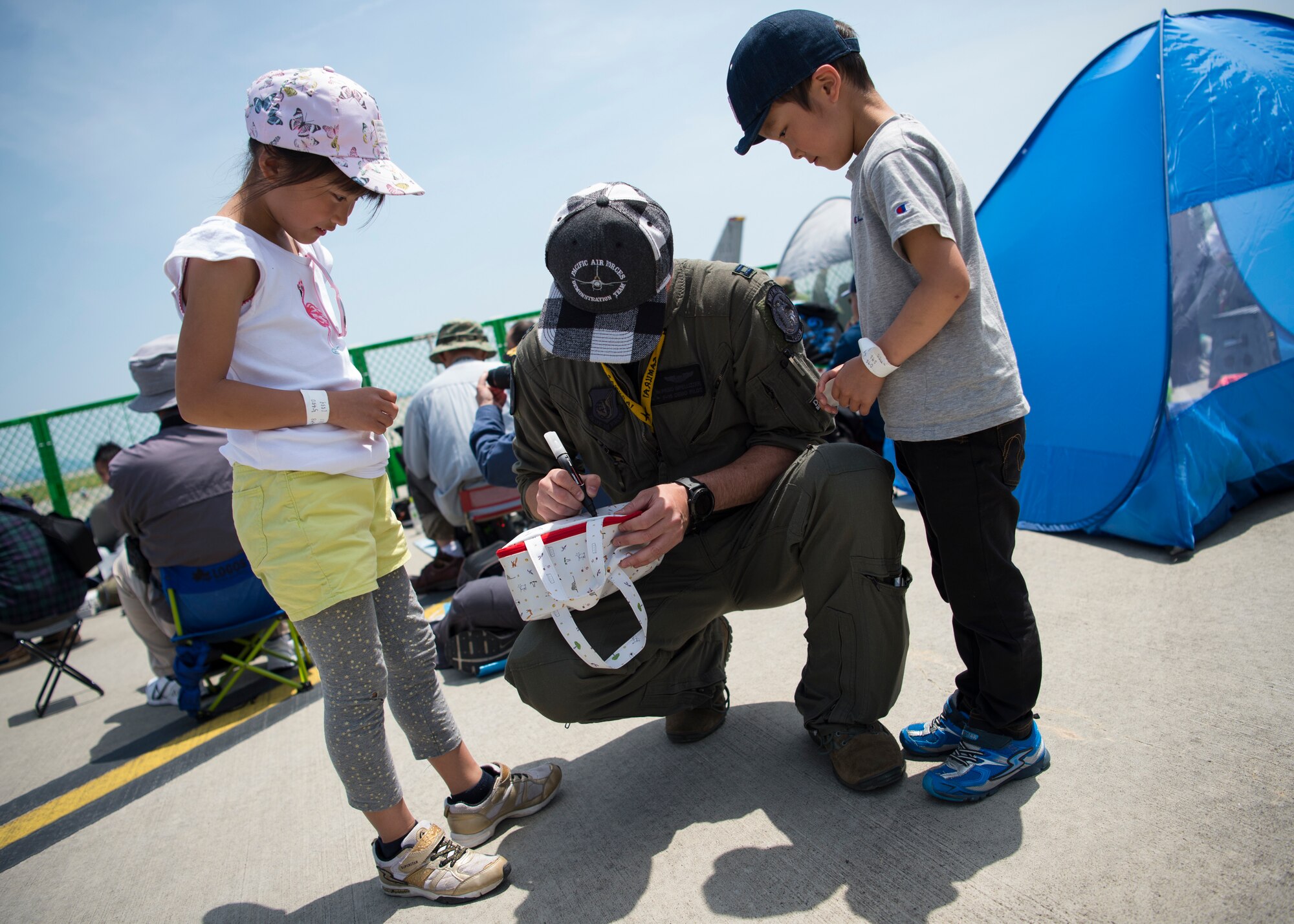 Signing autographs