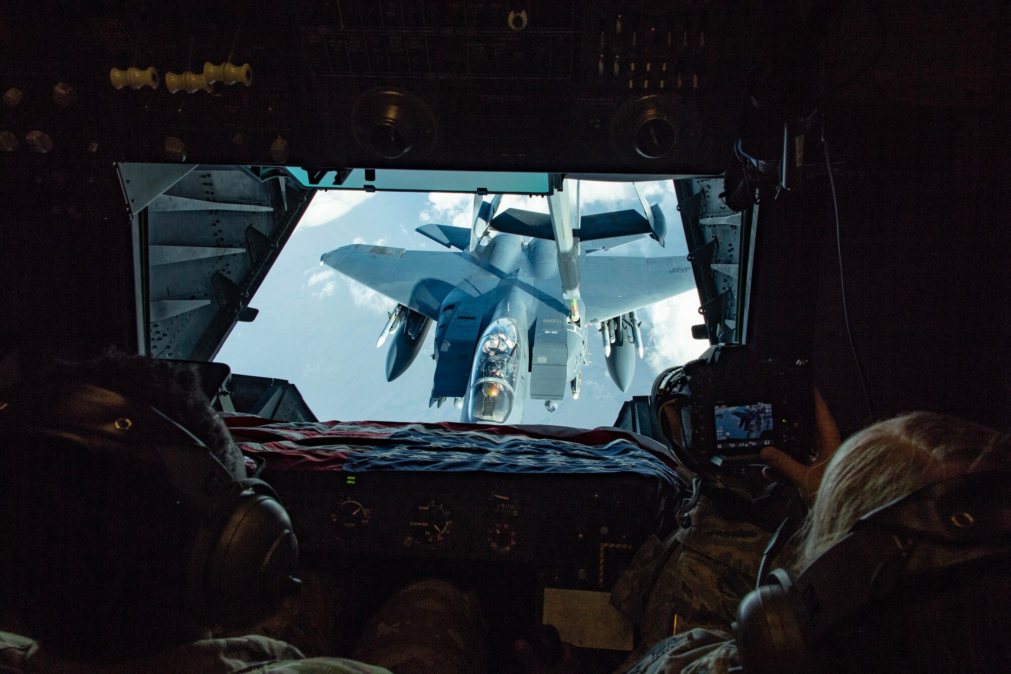 A U.S. Air Force F-15E Strike Eagle assigned to the 48th Fighter Wing, Royal Air Force Lakenheath, prepares to receive fuel from a U.S. Air Force KC-10 Extender from the 380th Air Expeditionary Wing over Southwest Asia, April 21, 2018. (U.S. Air National Guard photo by Tech. Sgt. Nieko Carzis)