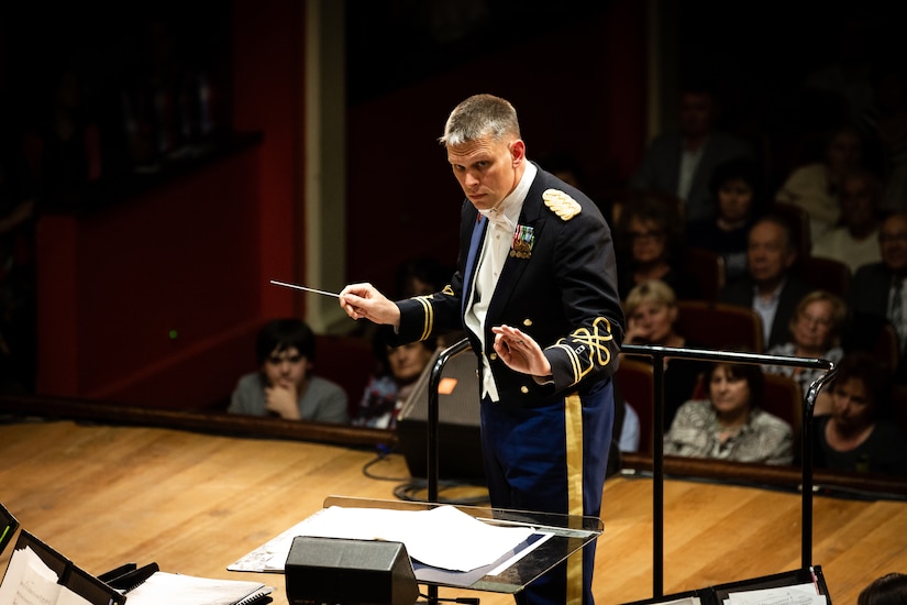 CW2 Chapman conducts the band