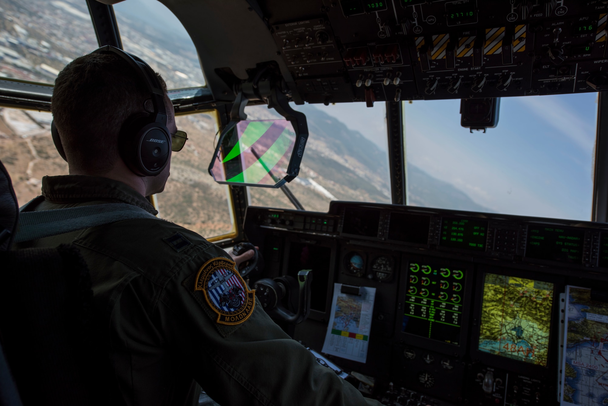 U.S. Air Force Capt. Tim Vedra, 37th Airlift Squadron C-130J Super Hercules pilot takes off from Elefsis Air Base, Greece, during exercise Stolen Cerberus V, May 9, 2018. The mission included Hellenic air force paratroopers conducting a water insertion jump. Combined exercises such as these enhance the interoperability capabilities and skills among allied and partner armed forces. (U.S. Air Force photo by Senior Airman Devin M. Rumbaugh)