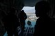 U.S. Army Sgt. Onnie Conyer (right), 21st Theater Sustainment Command 5th Quartermaster Company jumpmaster, watches as Hellenic paratroopers jump out of a U.S. Air Force C-130J Super Hercules during an exercise Stolen Cerberus V training mission in the skies near Elefsis Air Base, Greece, May 9, 2018. Conyer was responsible for verifying all jumpers were prepared for the jump. (U.S. Air Force photo by Senior Airman Devin M. Rumbaugh)