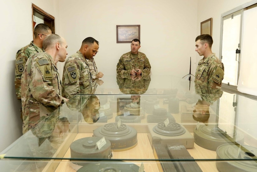 Soldiers with the 40th Brigade Engineer Battalion (BEB), 2d Brigade Combat Team, 1st Armored Division visit the Kuwait Land Forces (KLF) Institute Headquarters, Explosive Ordnance Disposal (EOD) Unit Museum during Kuwait Engineer Week. The week-long information exchange between the KLF and U.S. Army engineers enabled them to interact and share knowledge in their technical and tactical professional engineer methodologies, April 12, 2018.