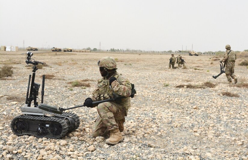 Soldiers of the 40th Brigade Engineer Battalion (BEB) demonstrate dismounted explosive hazard clearance operations with the Talon Robot, and VMR/2 Mine Hound to a group of more than 60 Kuwait Land Forces soldiers, U.S. Army engineers, and British liaison soldiers, during Engineer Week, April 9-13.