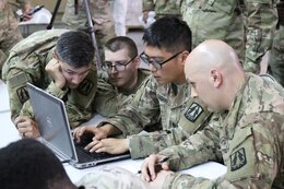 335th Signal Command (Theater) (Provisional) team participates in Best Cyber Ranger competition, Camp Arifjan, Kuwait, May 8.