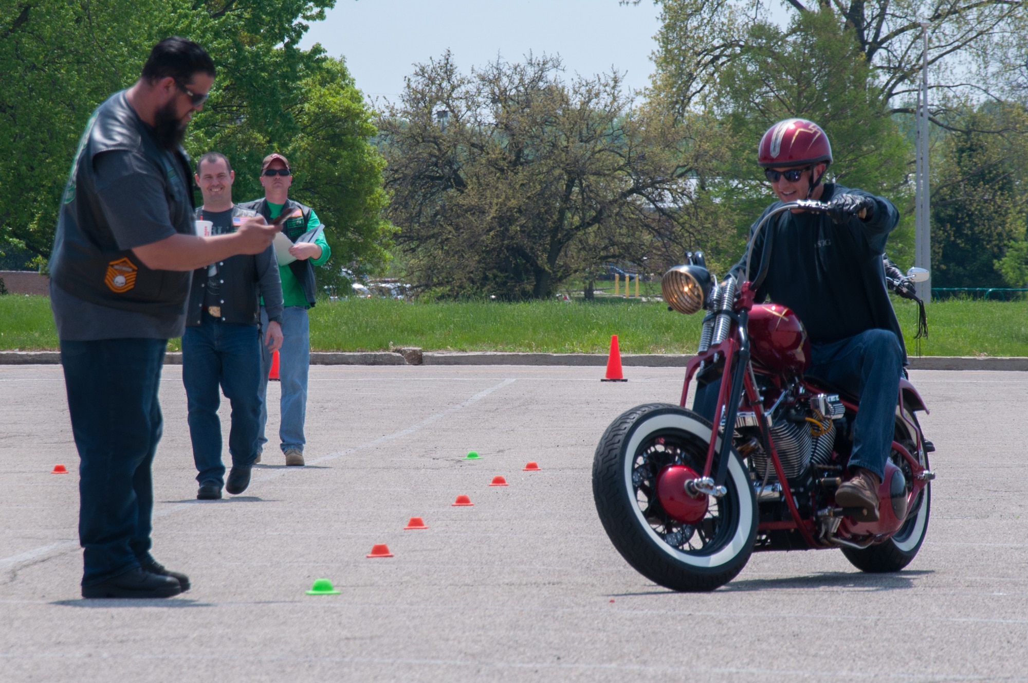 A rider competes in a slow ride contest as part of Wright-Patterson's Motorcycle Safety Day 2018.