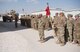 Airmen with the 332nd Air Expeditionary Wing and Soldiers with the 3-2 Air Defense Artillery Unit gather for a retreat ceremony honoring fallen defenders and office of special investigations agents during May 11, 2018, at an undisclosed location in Southwest Asia.