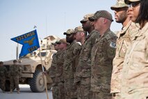 Airmen with the 332nd Air Expeditionary Wing and Soldiers with the 3-2 Air Defense Artillery Unit gather for a retreat ceremony honoring fallen defenders and office of special investigations agents during May 11, 2018, at an undisclosed location in Southwest Asia.