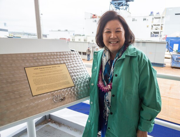 Irene Hirano Inouye, future USS Daniel Inouye (DDG 118) sponsor and wife of the late Sen. Daniel Inouye, presents her initials on the keel plate following the ship’s keel authentication ceremony in Bath, Maine, May 14