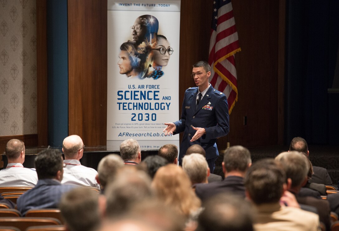 Maj. Brook Bentley, program manager with the Air Force Research Laboratory, introduces the technical themes of the U.S. Air Force Science and Technology 2030 Forum held May 10 at Indiana University. (Indiana University photo/Chris Meyer)
