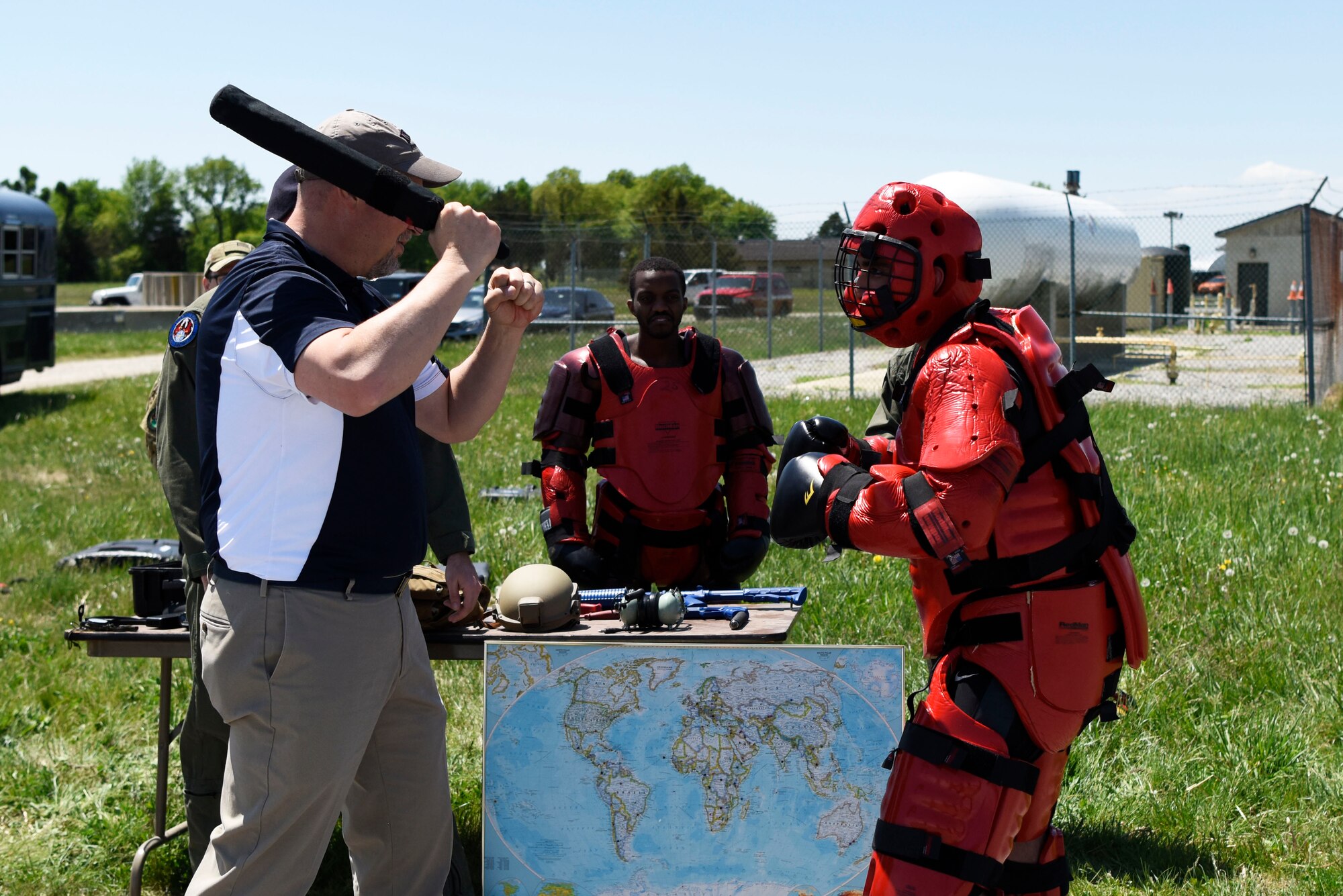 Kevin Mills, comptroller at Dover Motorsports, practices baton strikes on Airman 1st Class Alfonso Bustamante, 436th Security Forces raven, during an honorary commanders’ tour May 9, 2018, at Dover Air Force Base, Del. The tour group went from station to station getting a glimpse at different squadrons within the 436th Mission Support Group. (U.S. Air Force photo by Airman 1st Class Zoe Wockenfuss)