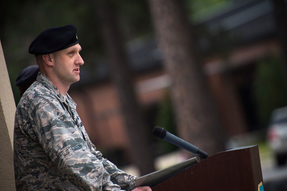 Maj. Charles Tenney, 23d Security Forces Squadron commander, offers opening remarks for Moody’s celebration of Police Week, May 14, 2018, at Moody Air Force Base, Ga. Police Week is celebrated in May of each year and is a national effort to recognize and honor law enforcement members who have lost their lives in the line of duty. Moody’s 2018 celebration includes a security forces muster, a 5k run, a vehicle showcase with vehicles from the Valdosta Police Department and the Georgia State Patrol as well as memorial ceremonies. (U.S. Air Force photo by Staff Sgt. Ryan Callaghan)
