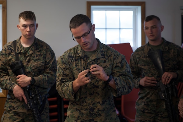 U.S. Marine Sgt. Derek R. Rush, marksmanship coach with Headquarters and Service Company, 6th Engineer Support Battalion, 4th Marine Logistics Group, Marine Forces Reserve, teaches how to properly break down a rifle during exercise Red Dagger at Fort Indiantown Gap, Pa., May 13, 2018.