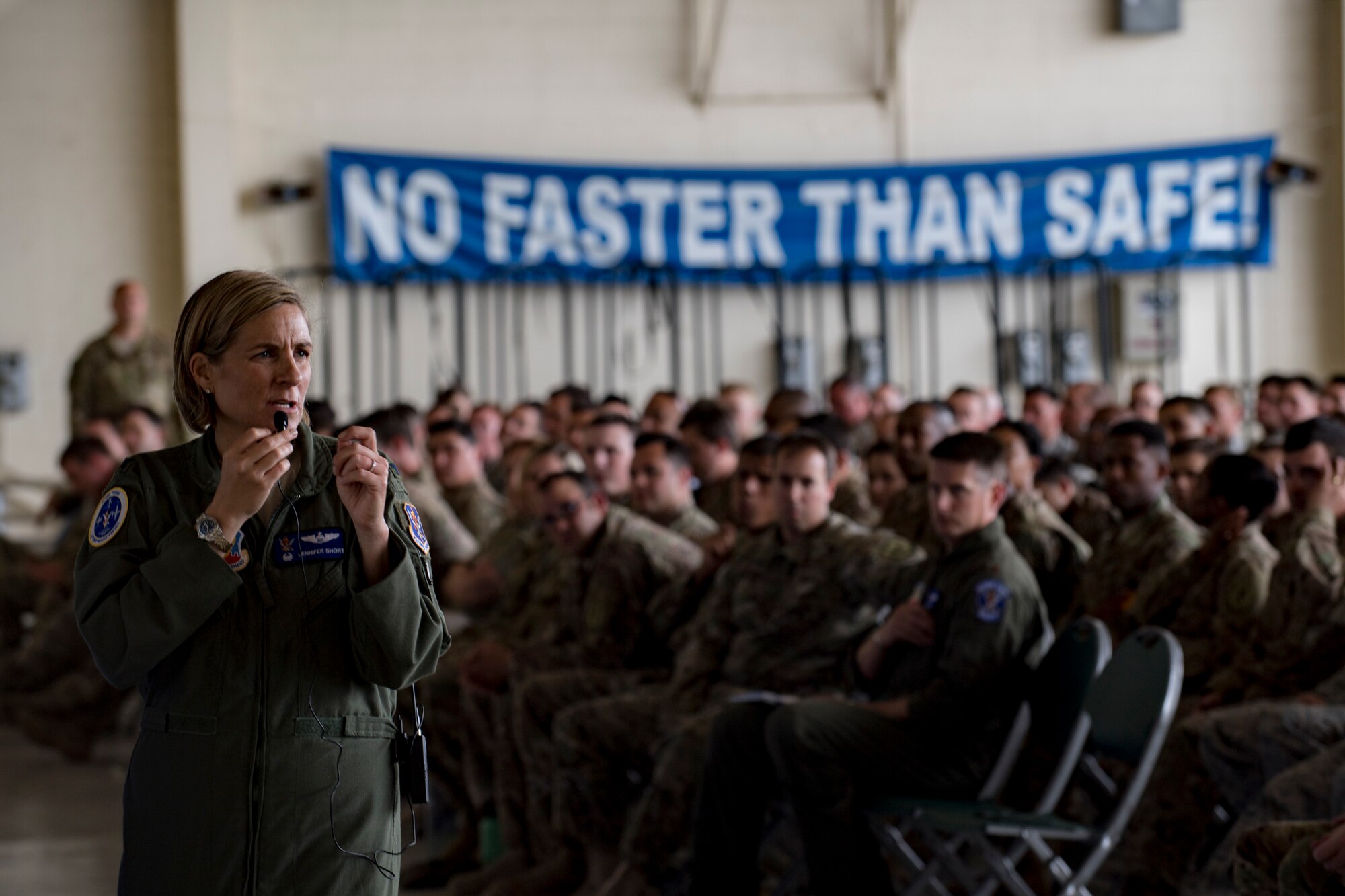 Col. Jennifer Short, 23d Wing commander, addresses Airmen from Team Moody’s operations and maintenance units during a one-day operational safety review, May 14, 2018, at Moody Air Force Base, Ga. During the safety review, the commander-led forum gathered feedback from Airmen who execute the Air Force's flying and maintenance operations and challenged them to identify issues that may cause a future mishap. (U.S. Air Force photo by Senior Airman Daniel Snider)