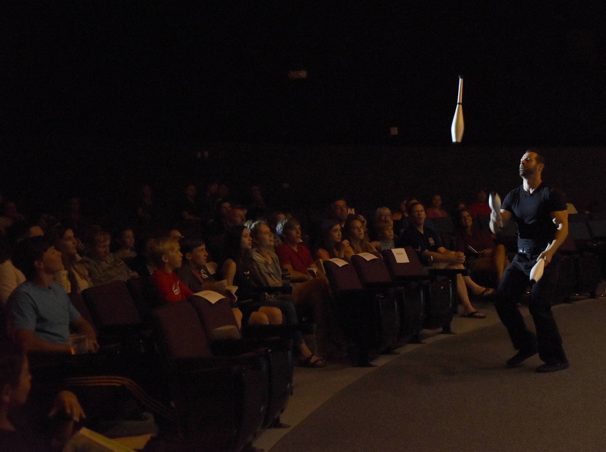 Ivan Pecel, juggler, performs a routine during his show at the Welch Theater at Keesler Air Force Base, Mississippi, May 9, 2018. Pecel, an award winning juggler with more than 15 years of juggling experience, is also a comedian and performed during the first season of America’s Got Talent. (U.S. Air Force photo by Kemberly Groue)
