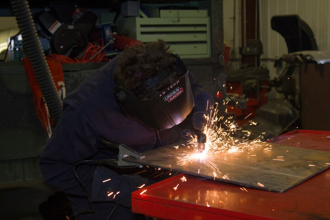 Students compete in a welding competition hosted by VTC and Vermont National Guard.
