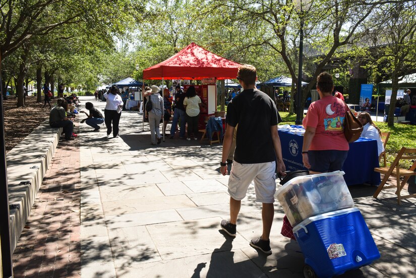 Attendees visit different booths during the fourth annual Federal Executive Association Government Expo May 11, 2018, at Liberty Square, Charleston, S.C.