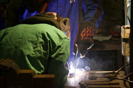 Students compete in a welding competition hosted by VTC and Vermont National Guard.