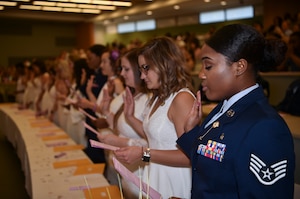 Trident Technical College dental hygienists recite the hygienist’s oath during graduation, May 3, 2018 in Charleston, S.C.