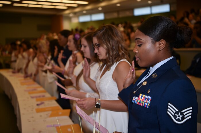 Trident Technical College dental hygienists recite the hygienist’s oath during graduation, May 3, 2018 in Charleston, S.C.