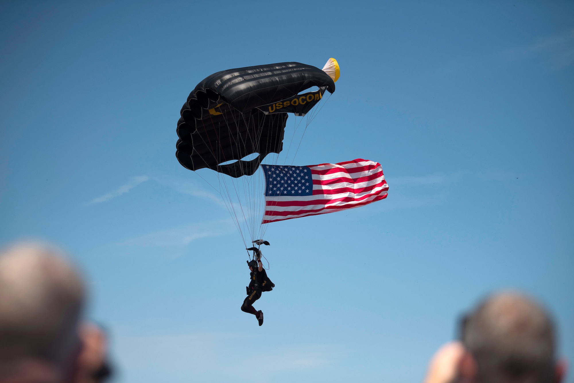 Chris Fucci, of the Para-Commandos, parachutes in on the flightline during Tampa Bay AirFest 2018 at MacDill Air Force Base, Fla., May 11, 2018. The Para-Commandos are U.S. Special Operations Command's premier aerial parachute demonstration team.