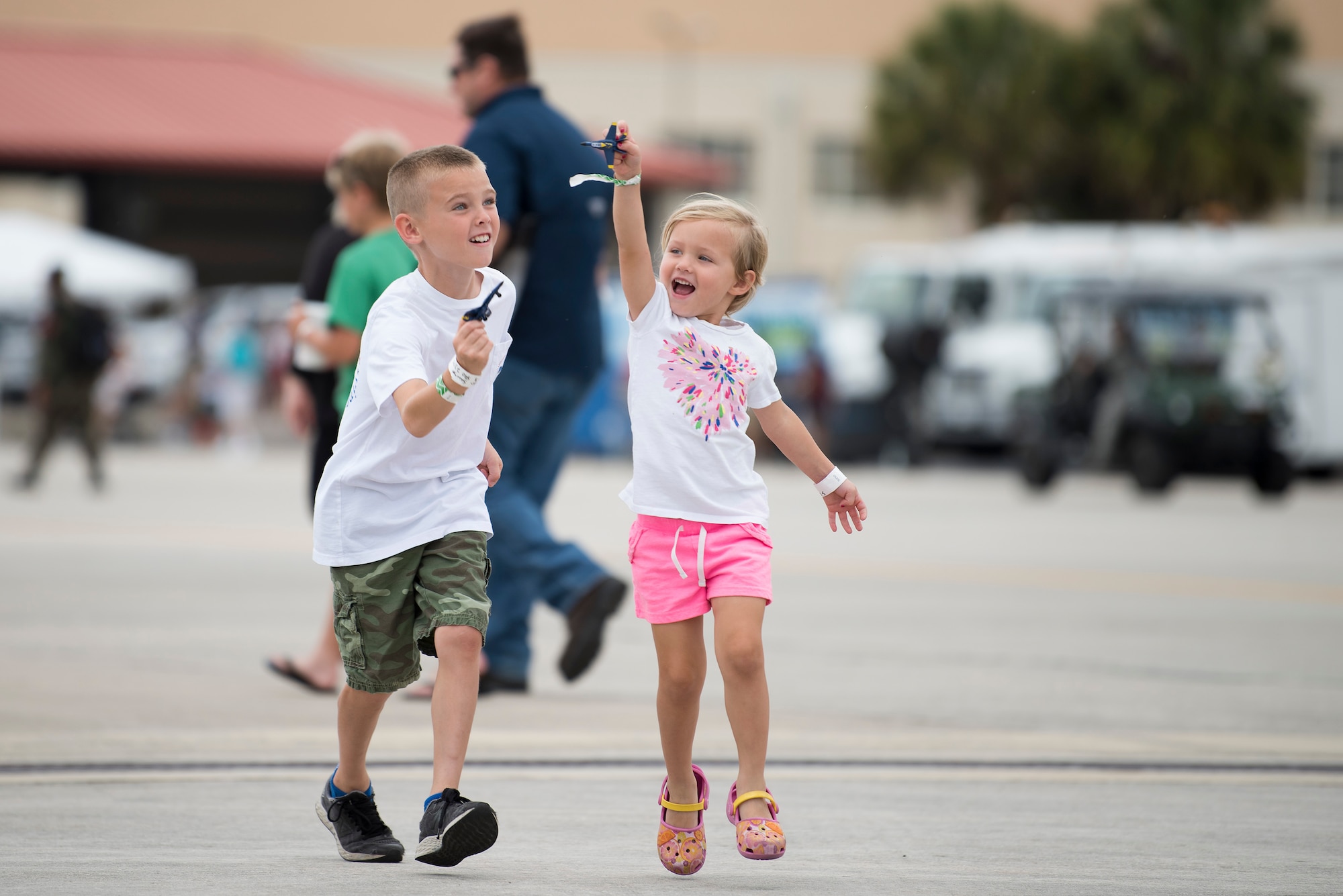 Children play with U.S. Navy Blue Angels toys during the Tampa Bay AirFest 2018 at MacDill Air Force Base, Fla., May 13, 2018. This year’s AirFest welcomed approximately 150,000 attendees over a three-day span to experience aerial demonstrations and interactive static displays.