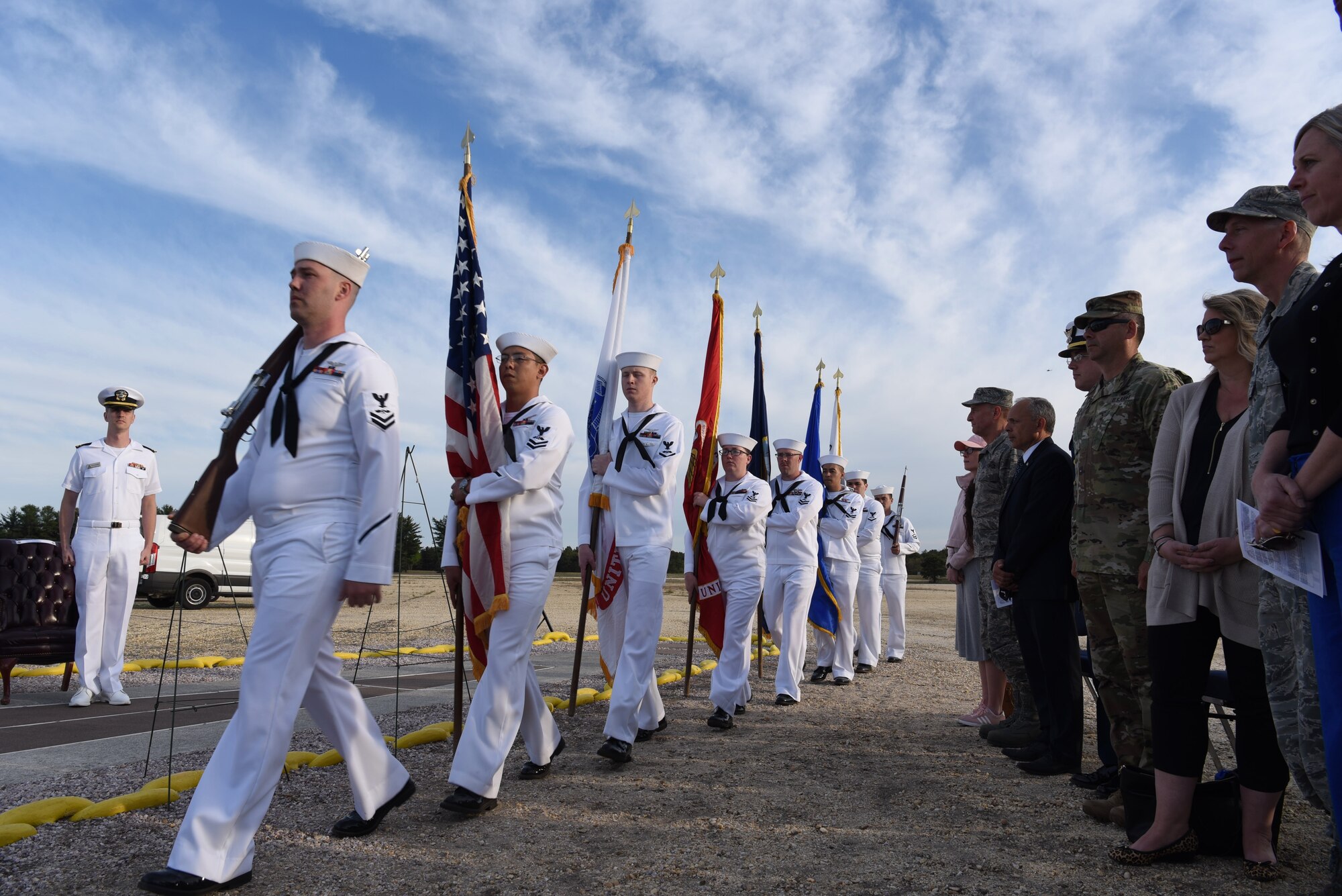 Naval Support Activity Lakehurst Honor Guard marches in to post the colors at Joint Base McGuire-Dix-Lakehurst, N.J. on May 09, 2018. The Honor Guard began the sequence of events for the Hindenburg Memorial Ceremony. (U.S. Marine Corps photo by Lance Cpl. Stanley Moy/ Released)