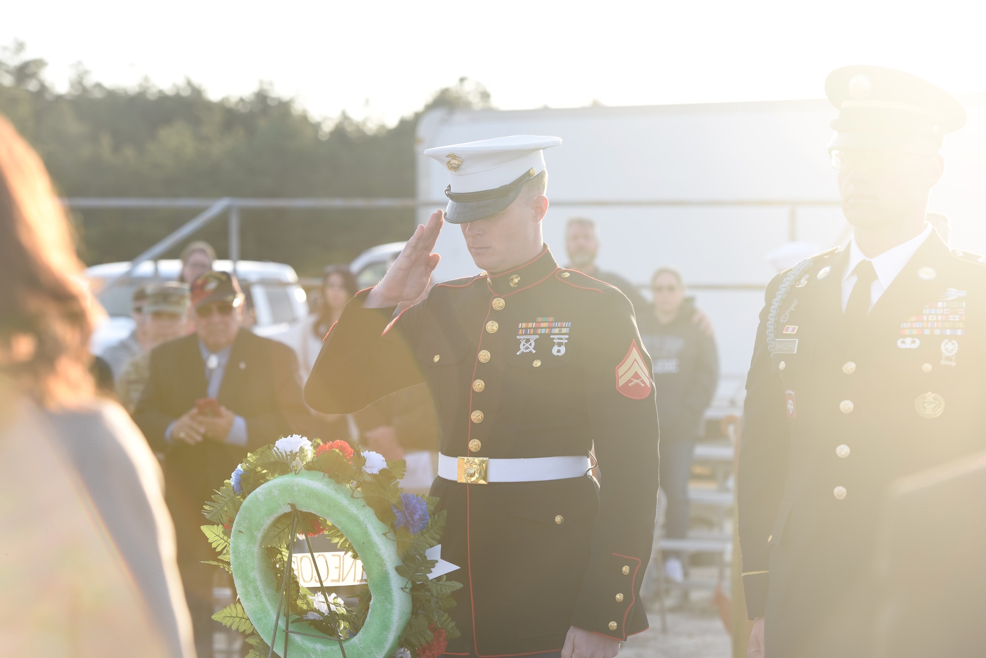 Cpl. Eric Flemming salutes a wreath during the Hindenburg Memorial Ceremony at Joint Base McGuire-Dix-Lakehurst on May 09, 2018. The wreath presentation was done to honor all Navy and Army airship losses. (U.S. Marine Corps photo by Lance Cpl. Stanley Moy/ Released)
