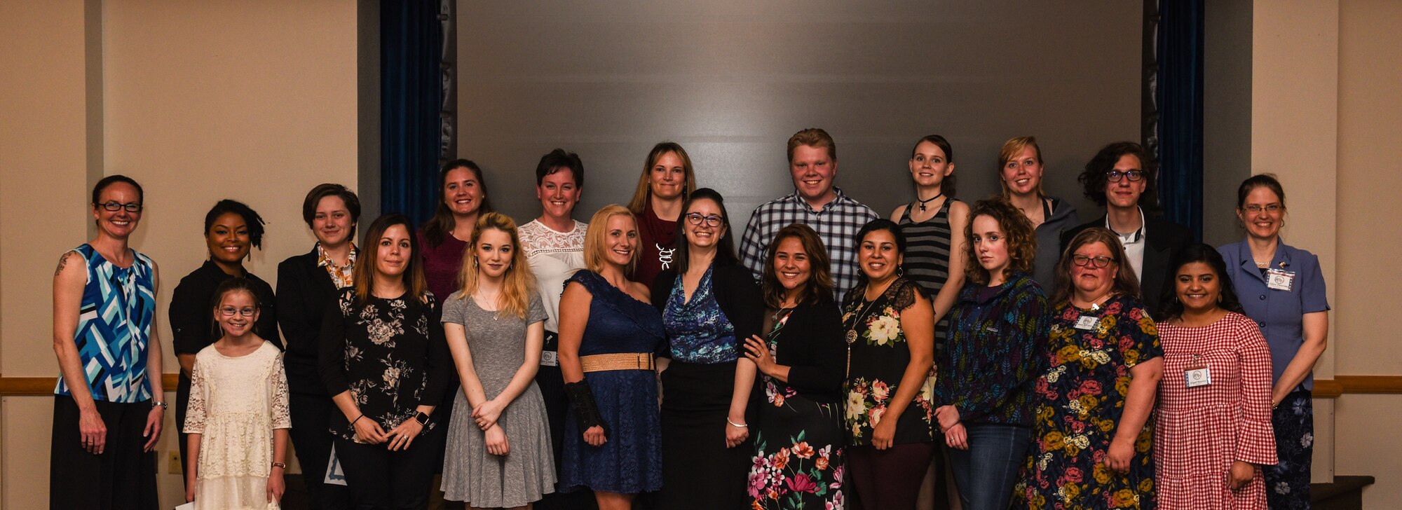 Col. Stacy Jo Huser, 90th Missile Wing commander, stands with the Warren Spouses’ Club Scholarship winners during a banquet, May 14, 2018, on F.E. Warren Air Force Base, Wyo. The WSC gave out $24,500 in scholarships to active duty, guard, reservists, spouses and dependents who reside in Laramie County, Wyo. (U.S. Air Force Photo by Airman 1st Class Braydon Williams)
