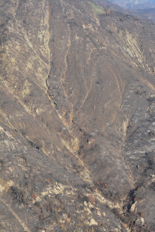 Burn scars on the mountainsides overlooking Santa Barbara County can be seen Jan. 18 from a UH-60 Blackhawk helicopter.